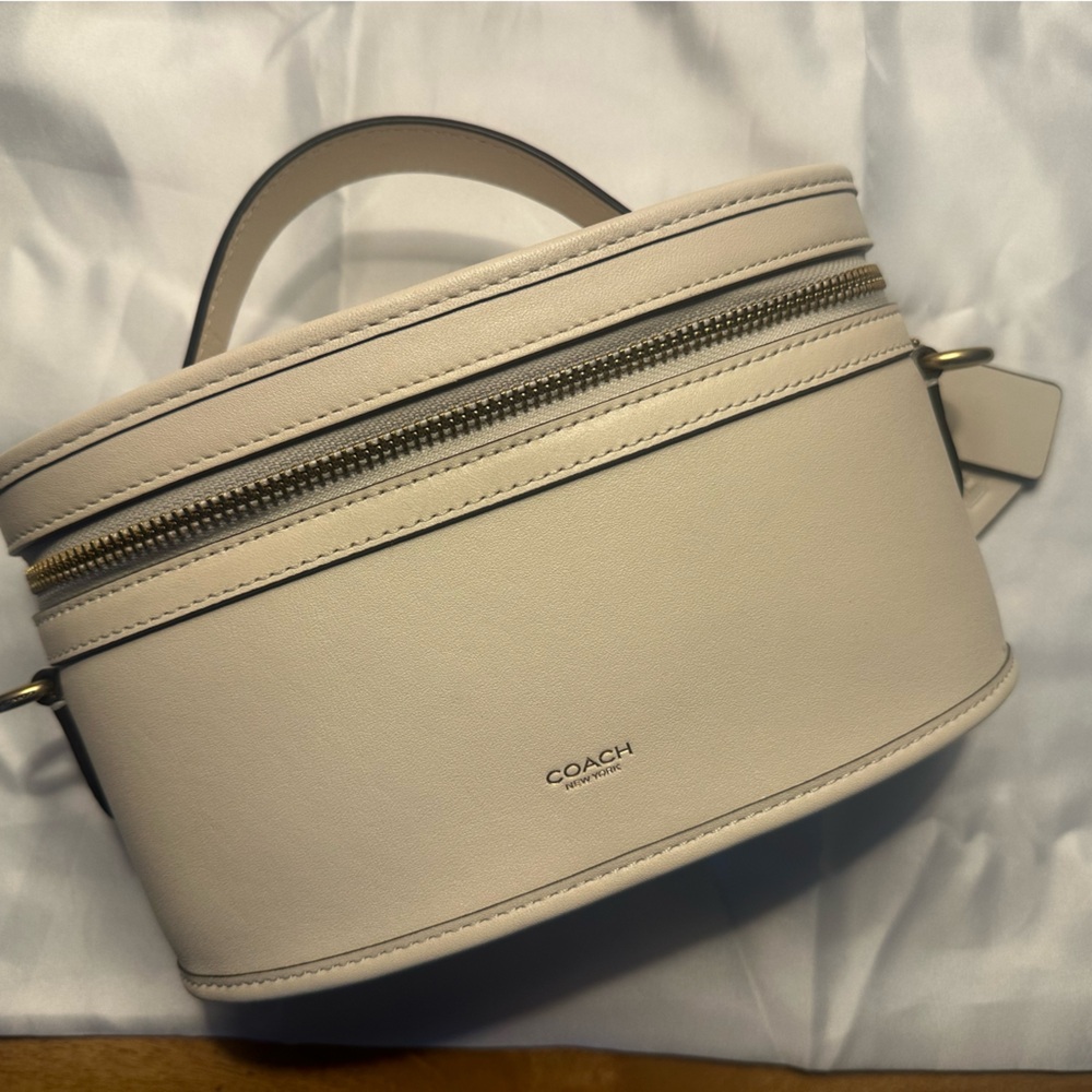 Coach 2004 Re-Edition Pebble Leather Round Crossbody Bag in Light Beige